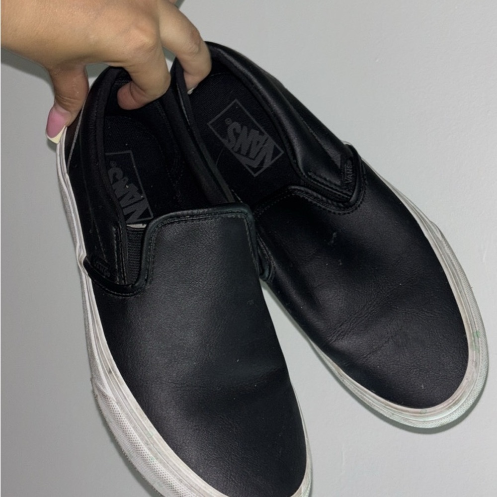 Vans Black Canvas Slip-Ons